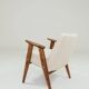 Vintage armchair with rustic wood and beige bouclé design by Chierowsky.
