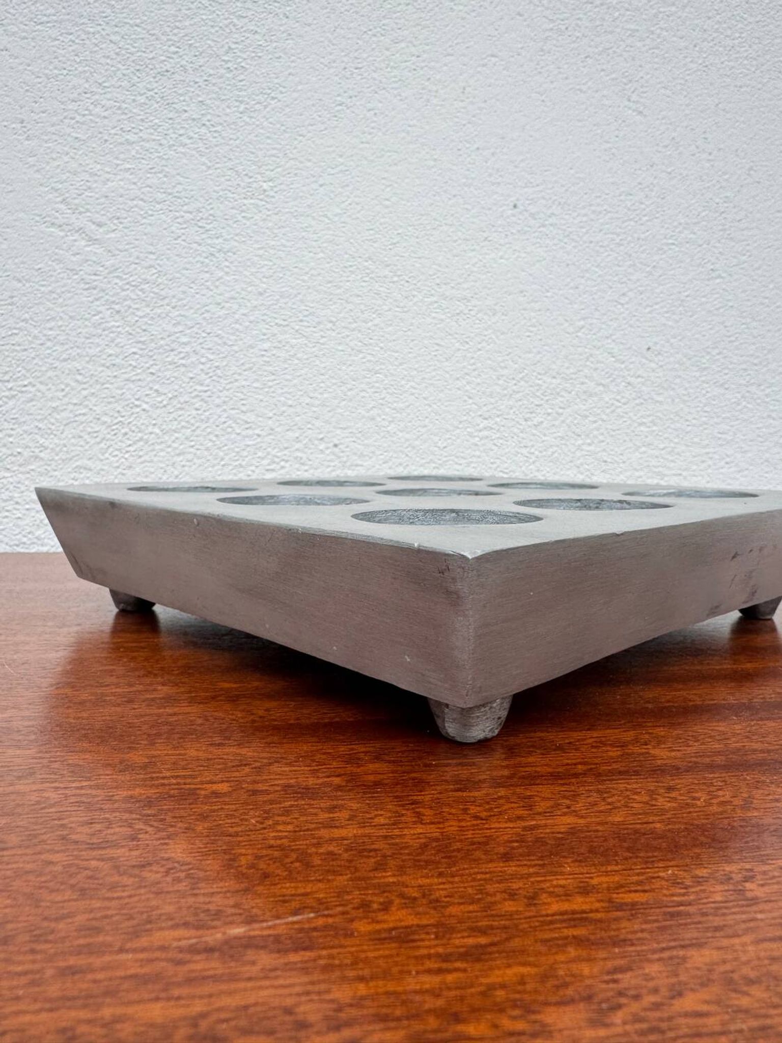 Brutalist style brushed aluminum candle holder