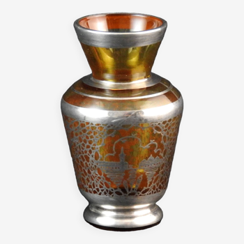 Old small glass vase decorated with silver