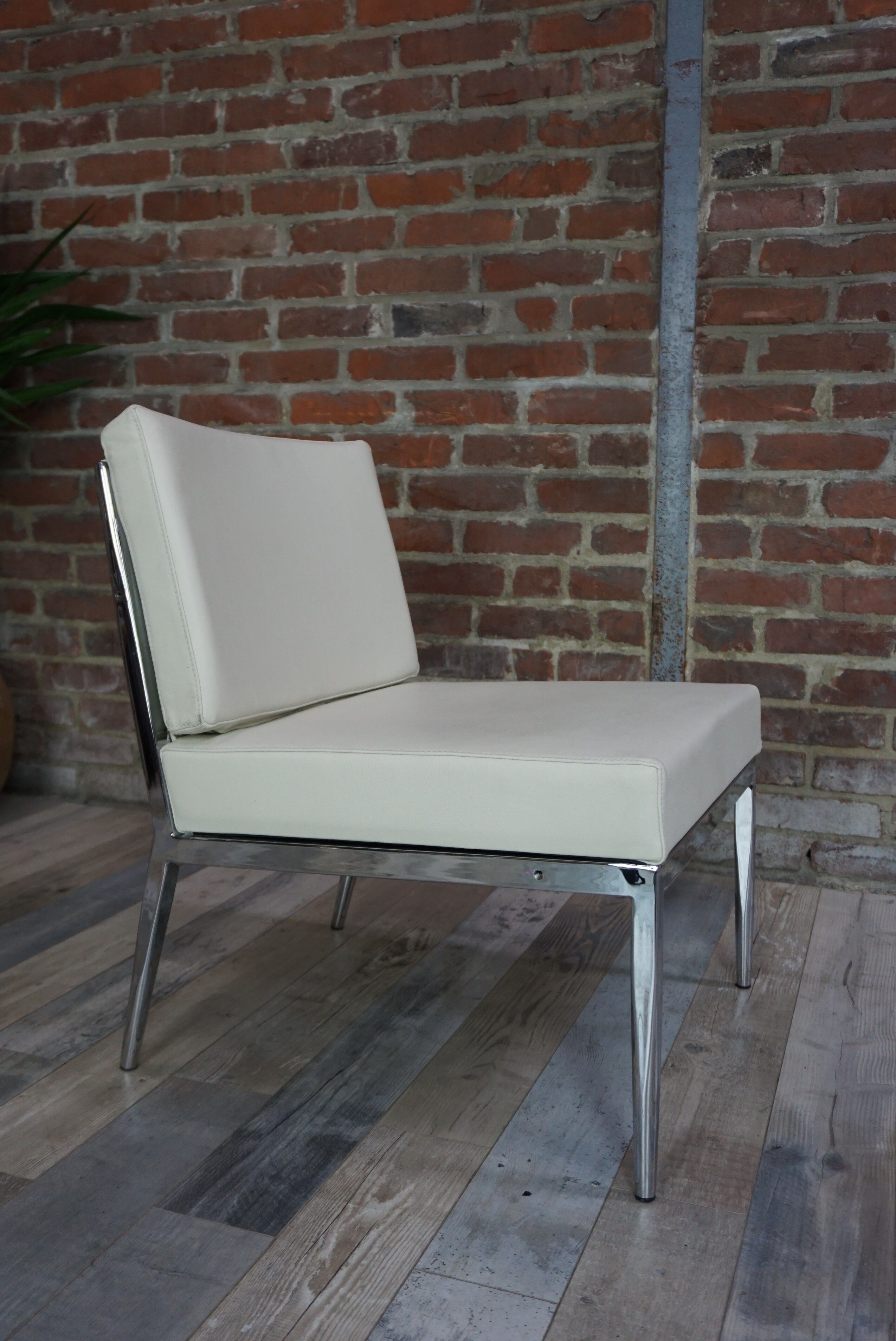 Pair of chrome and leather armchairs