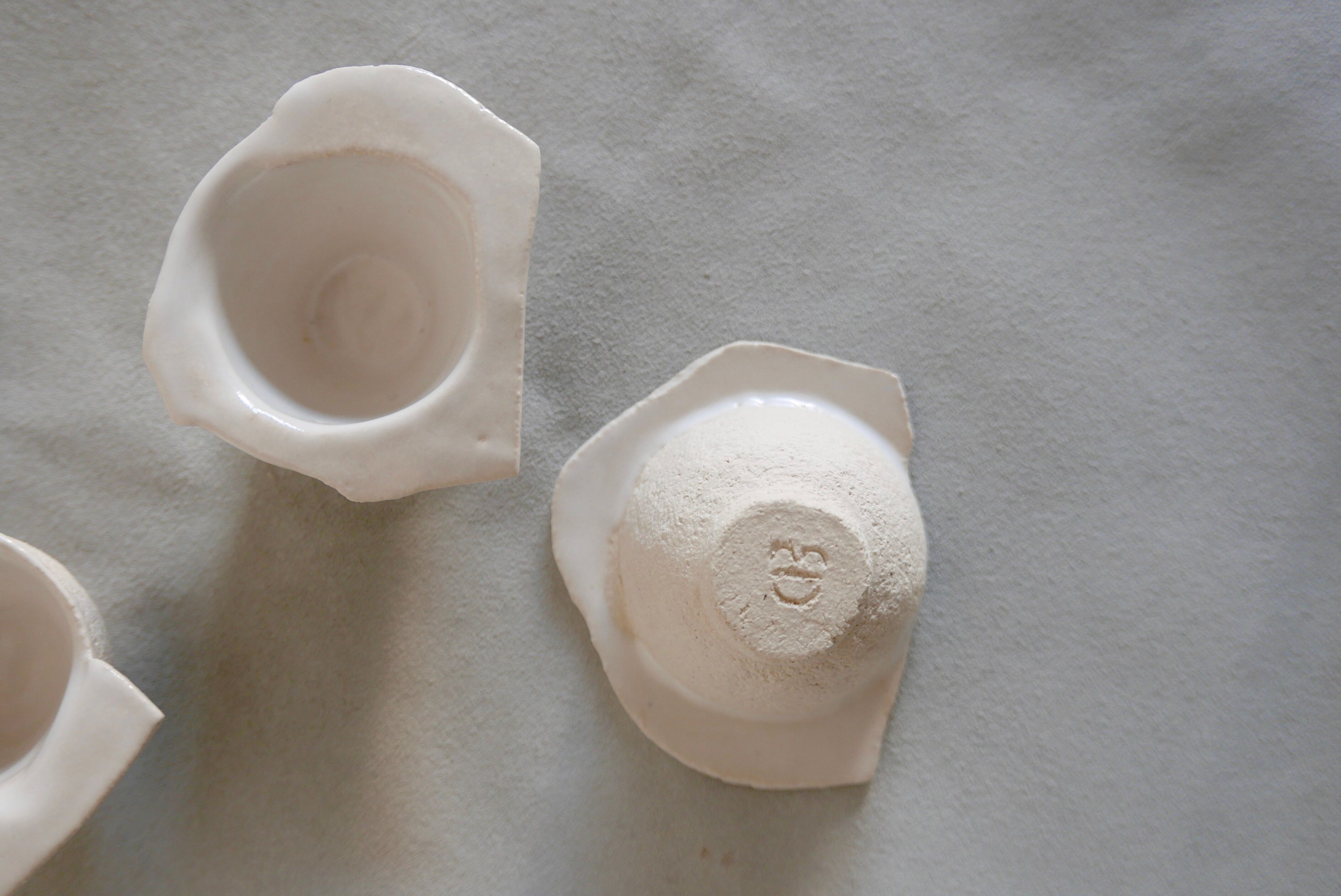 Six white stoneware sake glasses Denise Bresciani ceramics