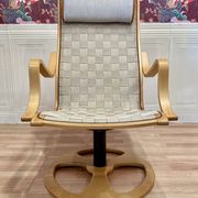 ARMCHAIR AND ITS OTTOMAN "SCANDINAVIAN DESIGN".