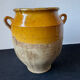 Old yellow glazed terracotta grease pot south west France