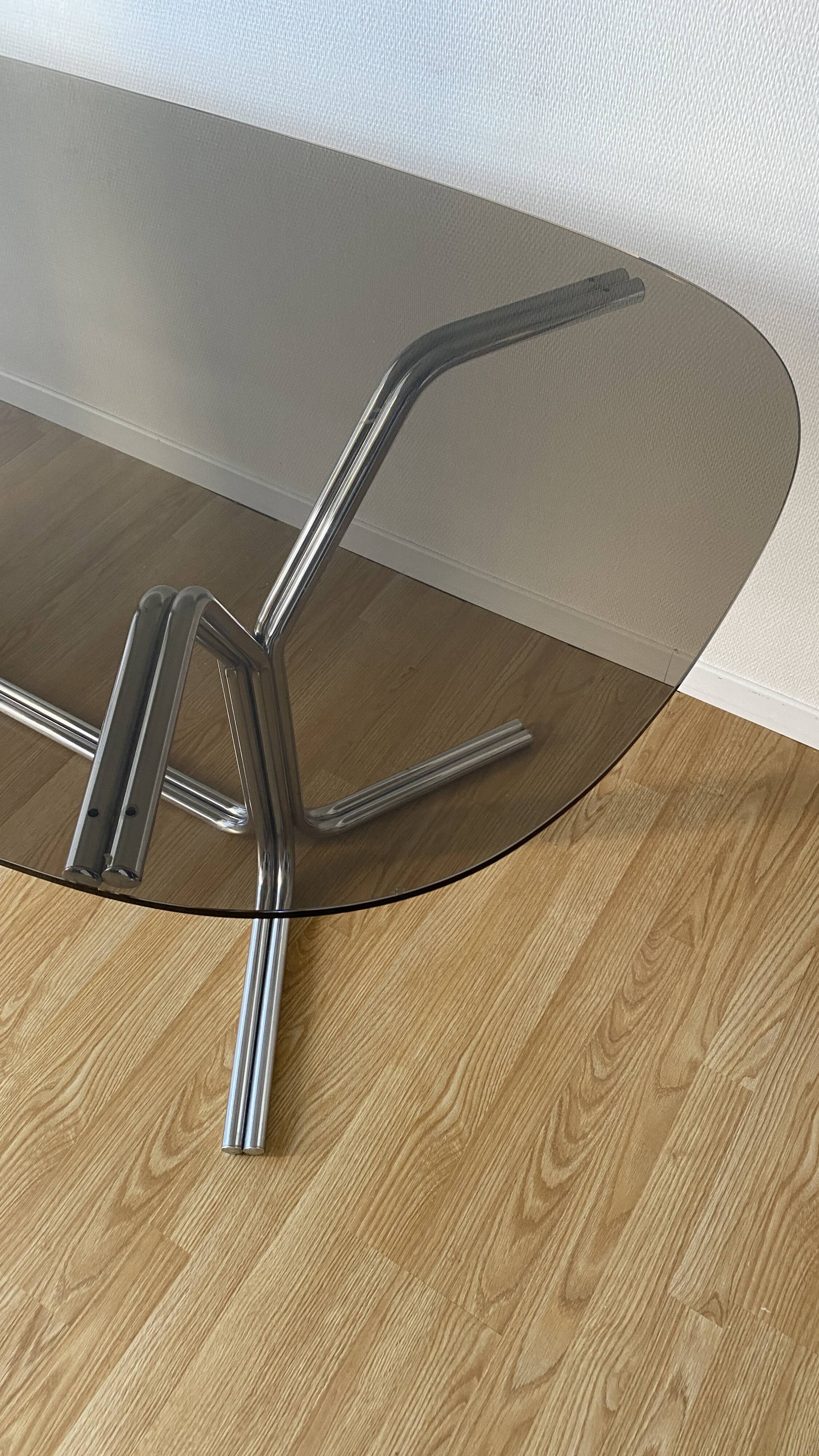 70s oval dining table in glass and chrome