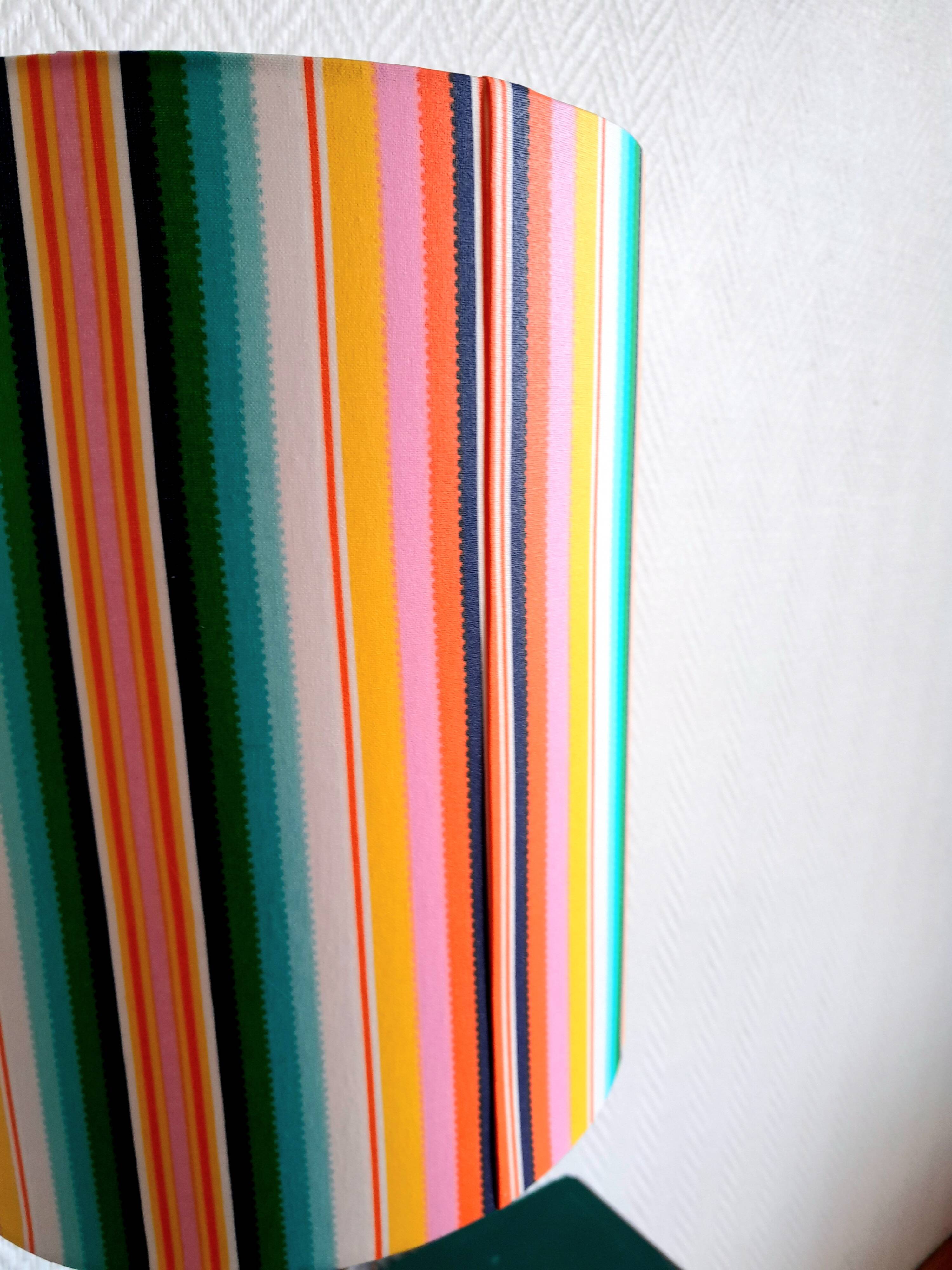 Wooden lamp with striped lampshade