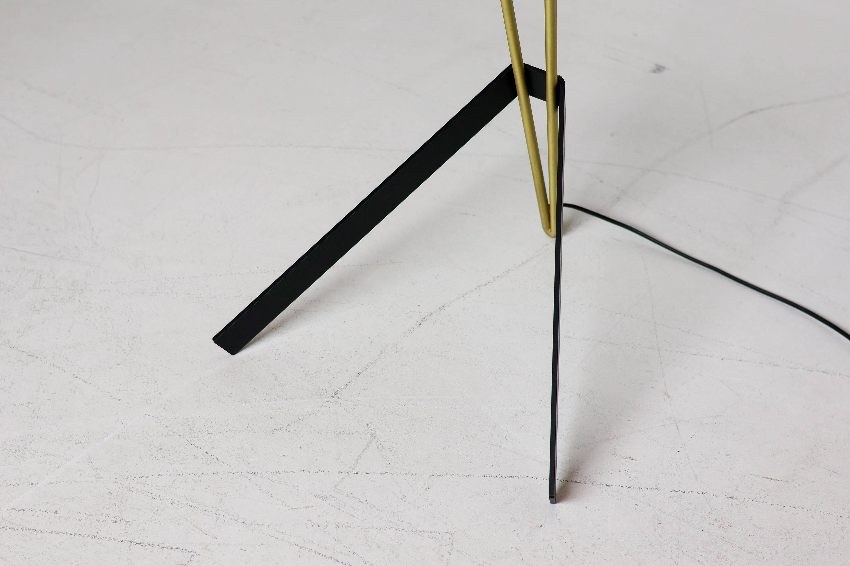 Kite floor lamp by Pierre Guariche, brass and steel, mid-20th century.
