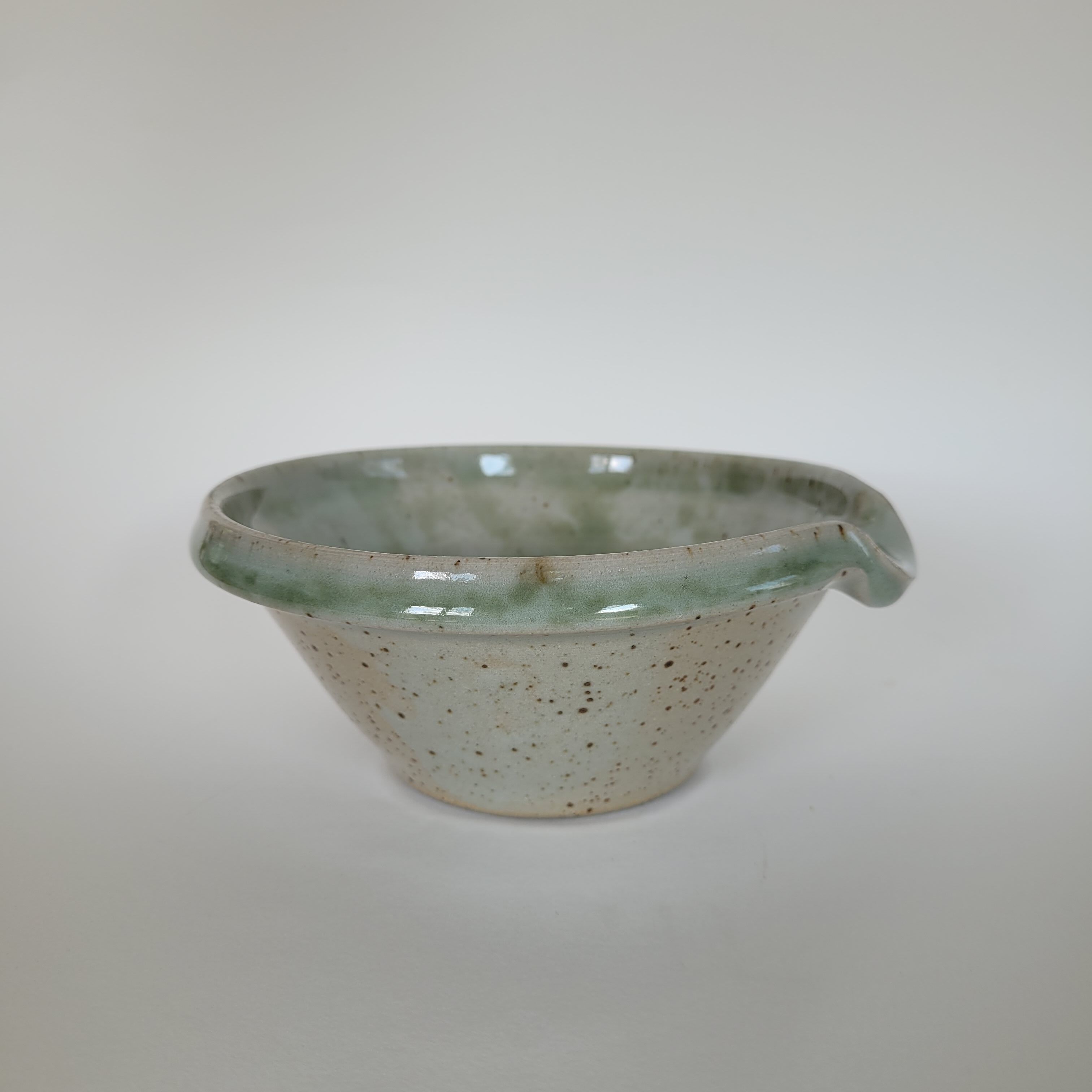 Bowl spout in sandstone