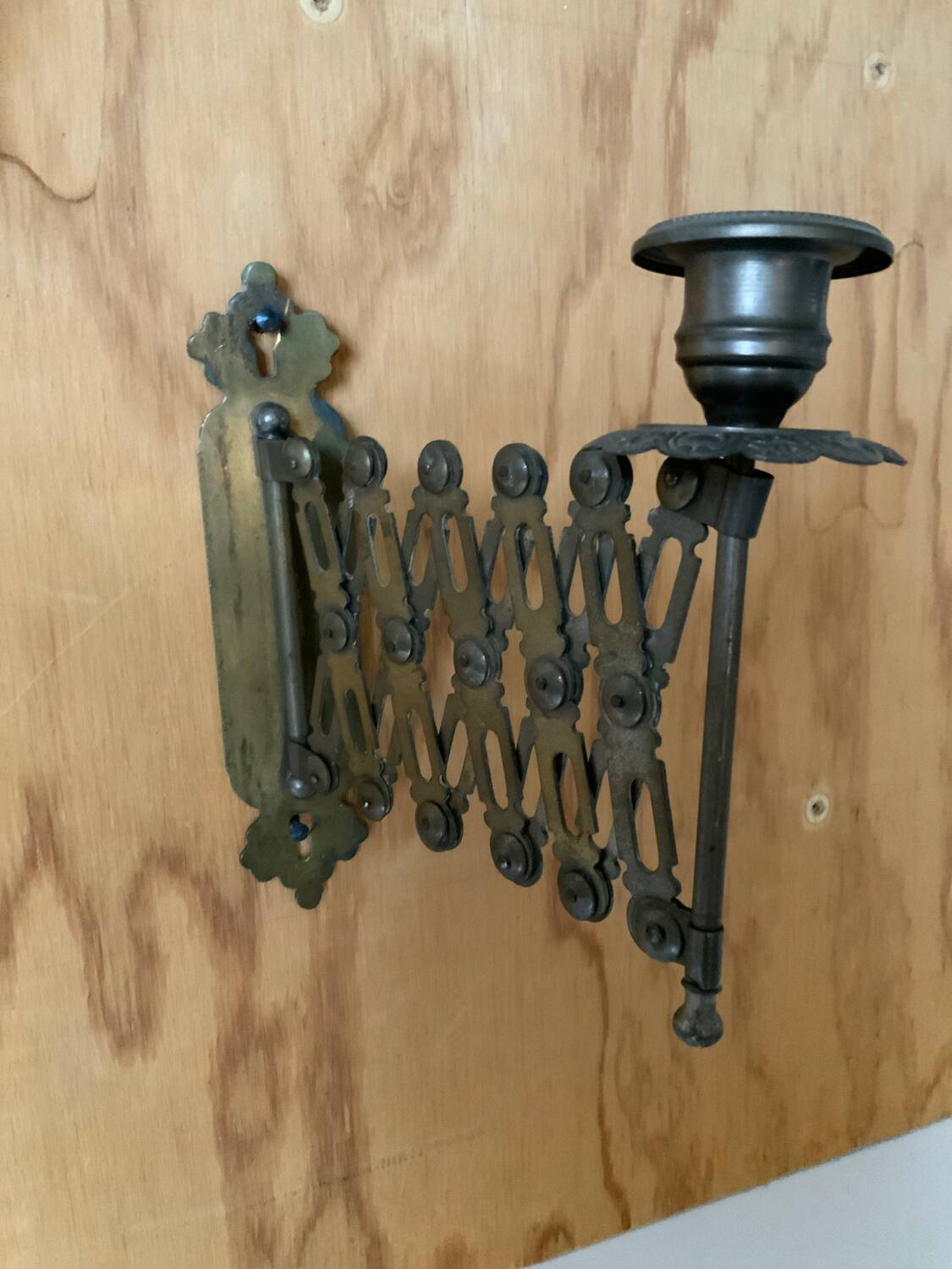 Accordion brass candle holder