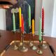 Set 7 mismatched brass and bronze candlesticks