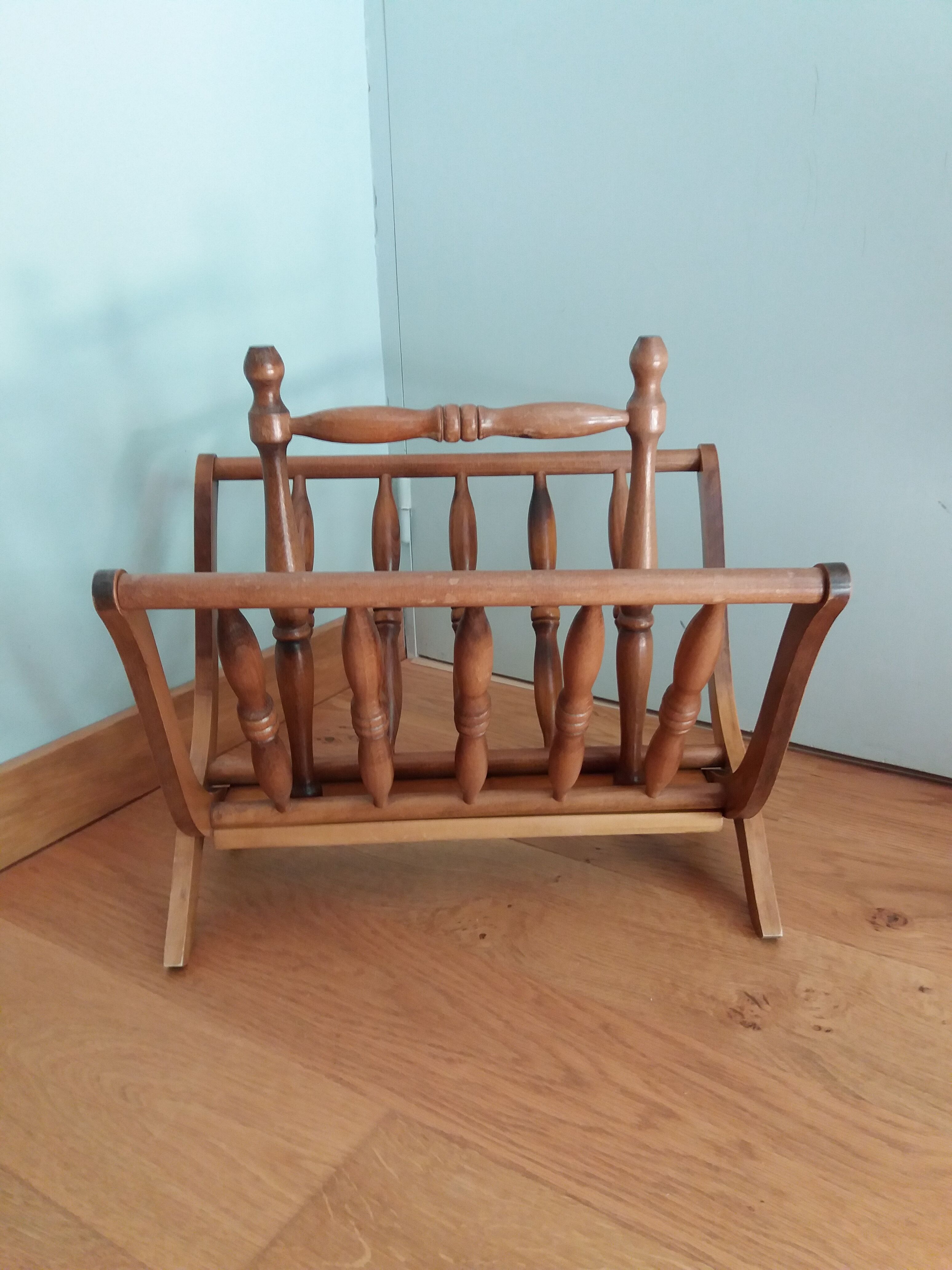 Turned wooden magazine holder