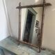 Large barber mirror from the 1940s/50s made of turned wood in a bamboo style.