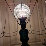 Matte black lamppost with small tablet