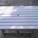 Old garden table with iron slats