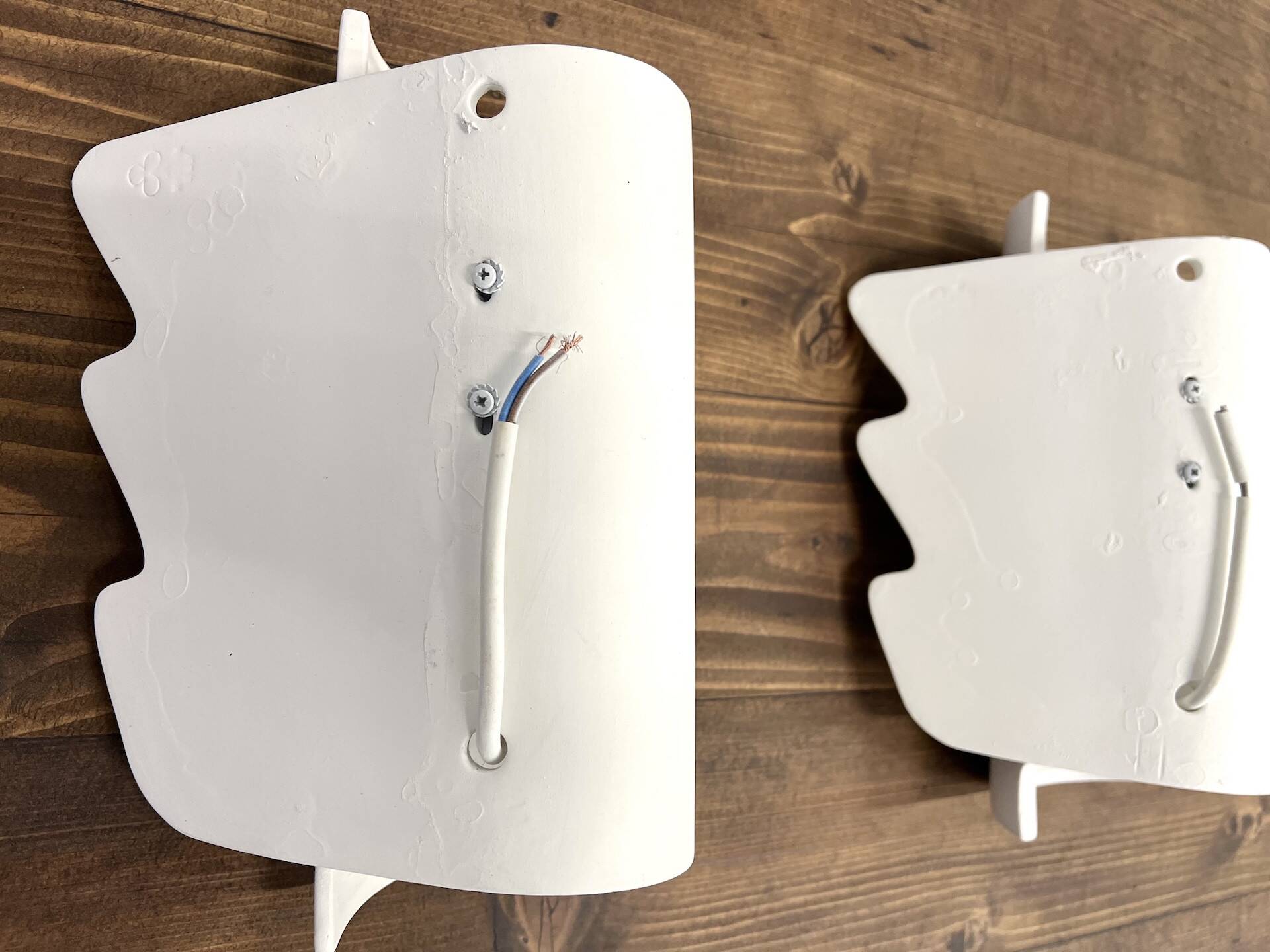 Pair of ceramic wall lights, circa 1990