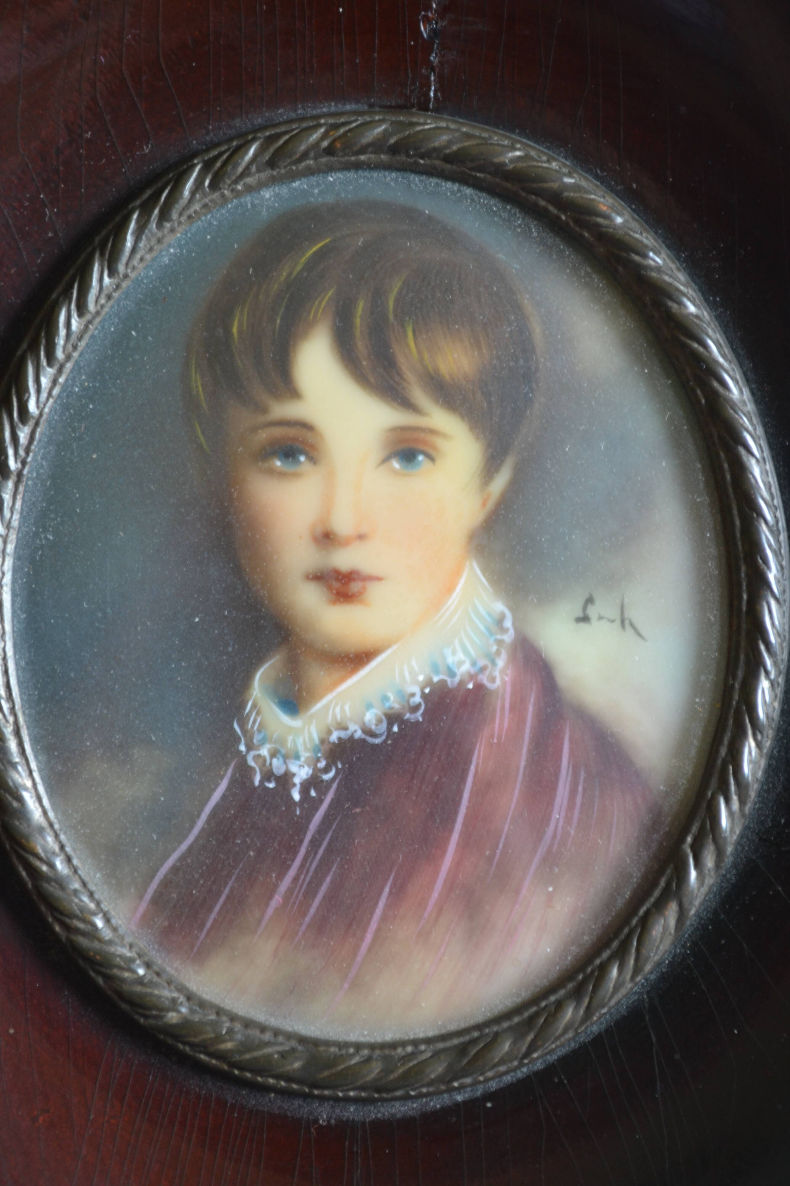 Miniature portrait of a young boy, framed and under glass