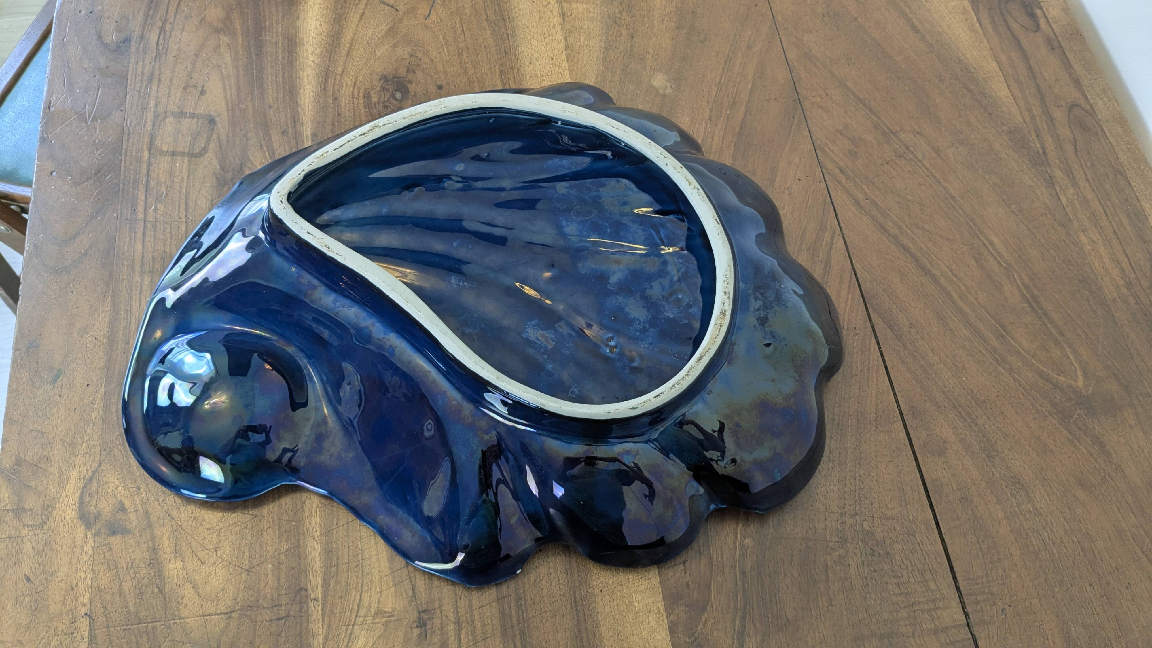 Large vintage shell-shaped blue glazed ceramic bowl
