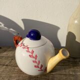 Teapot in white ceramic baseball