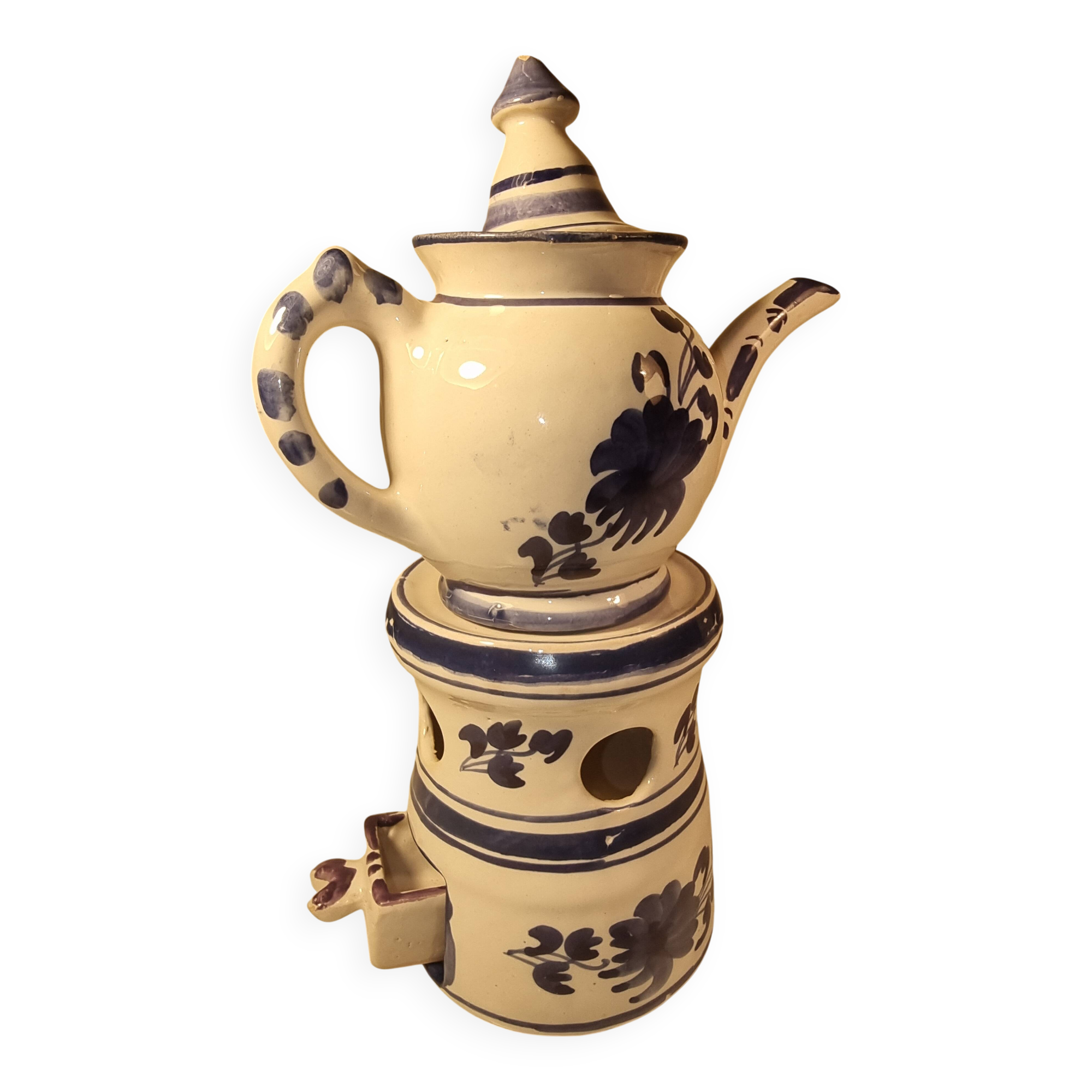 Vintage teapot in earthenware
