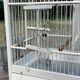 1950s wooden and metal birdcage with period accessories