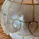 Vintage pendant in mother-of-pearl and brass, 1970s.