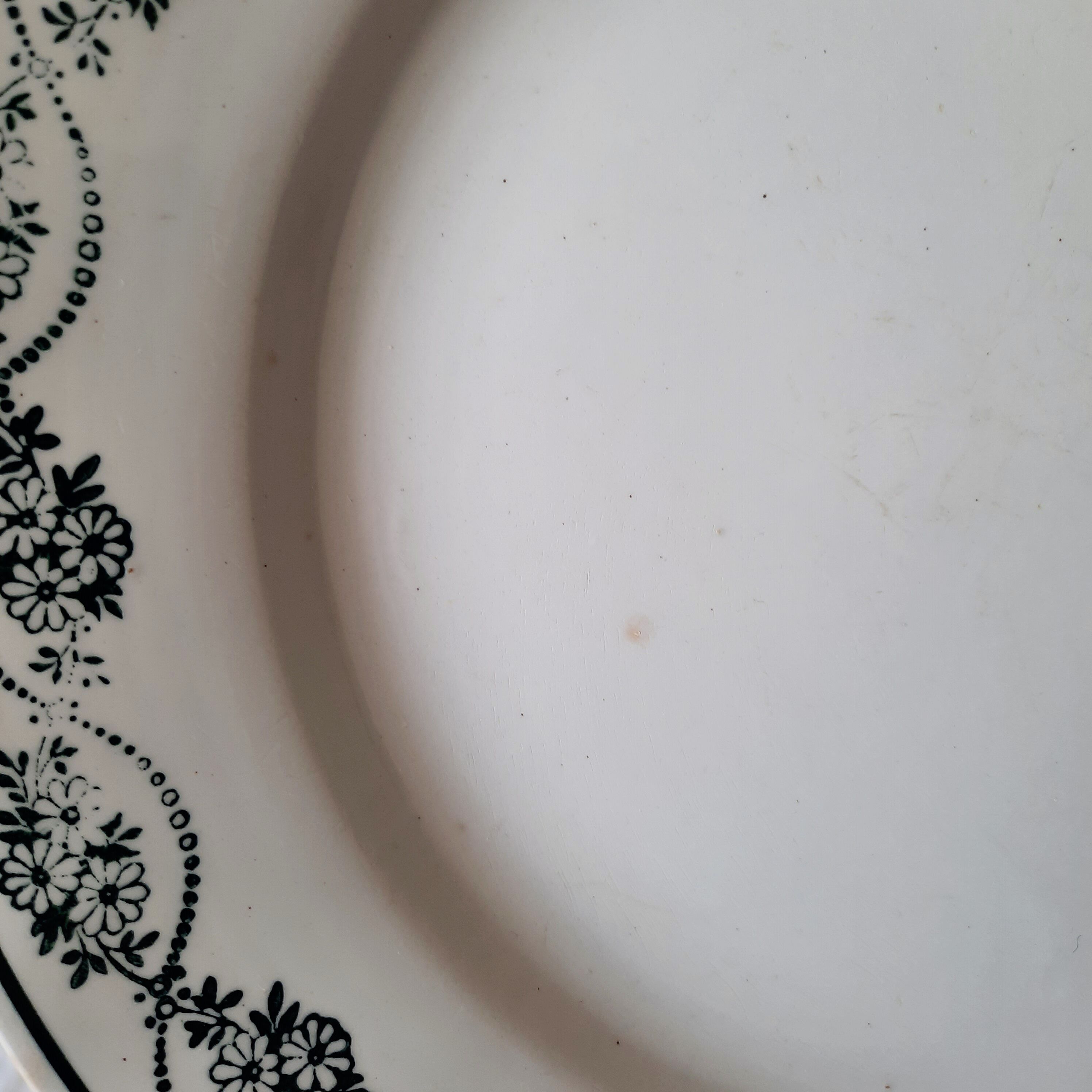 Old flat plates mismatched in earthenware