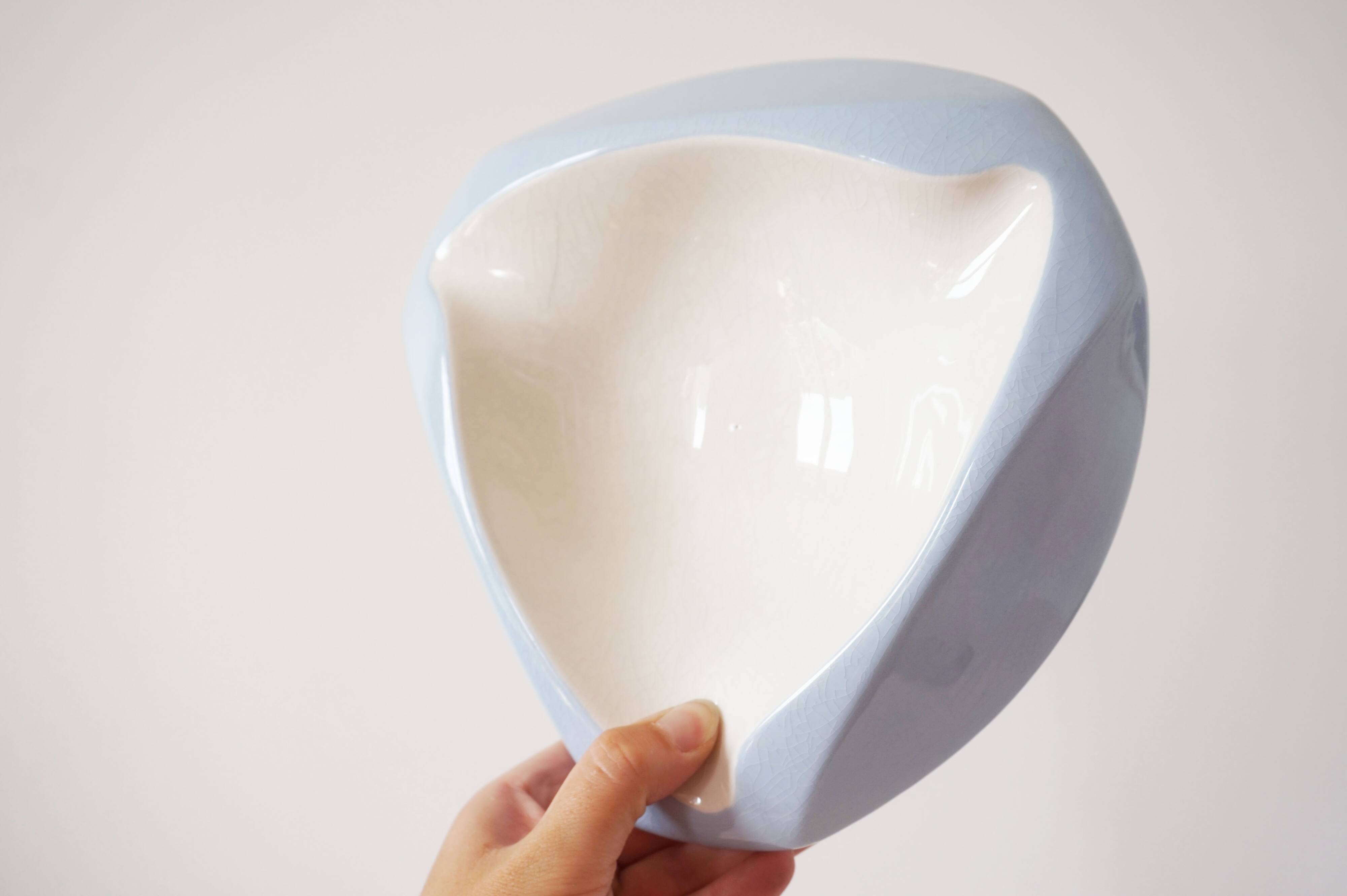 Large white and sky blue ceramic catchall from the 1950s.