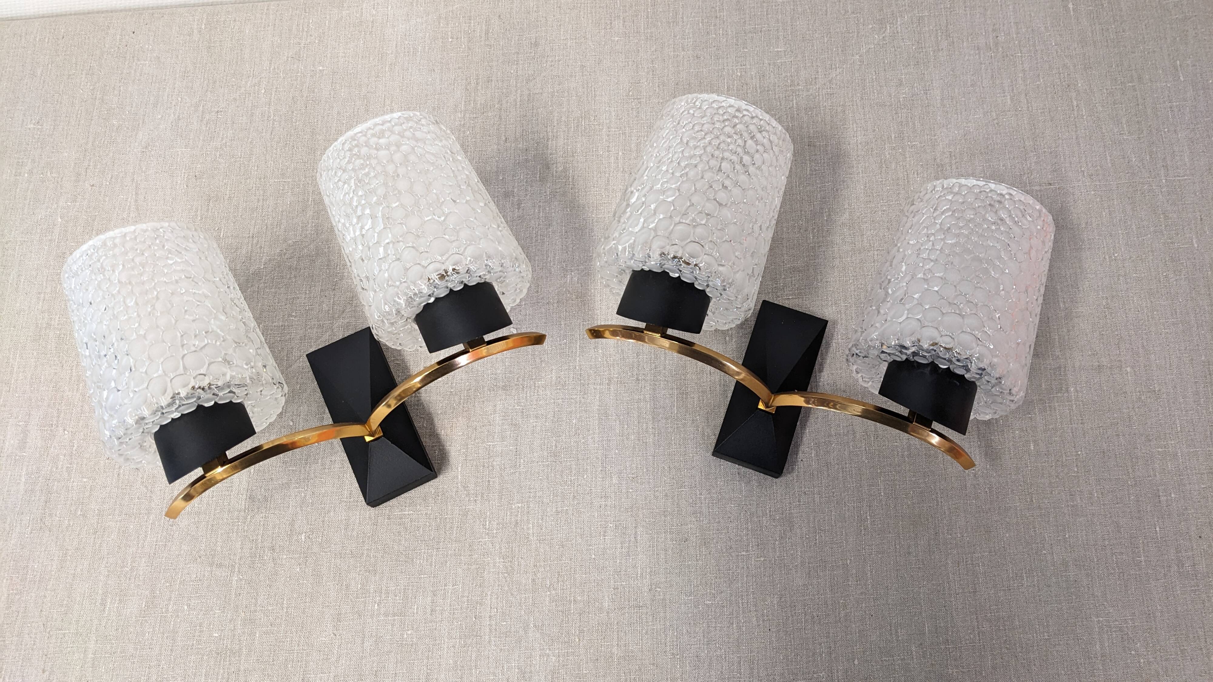 Pair of double wall lights in bubbled glass by Maison Arlus, France circa 1960.