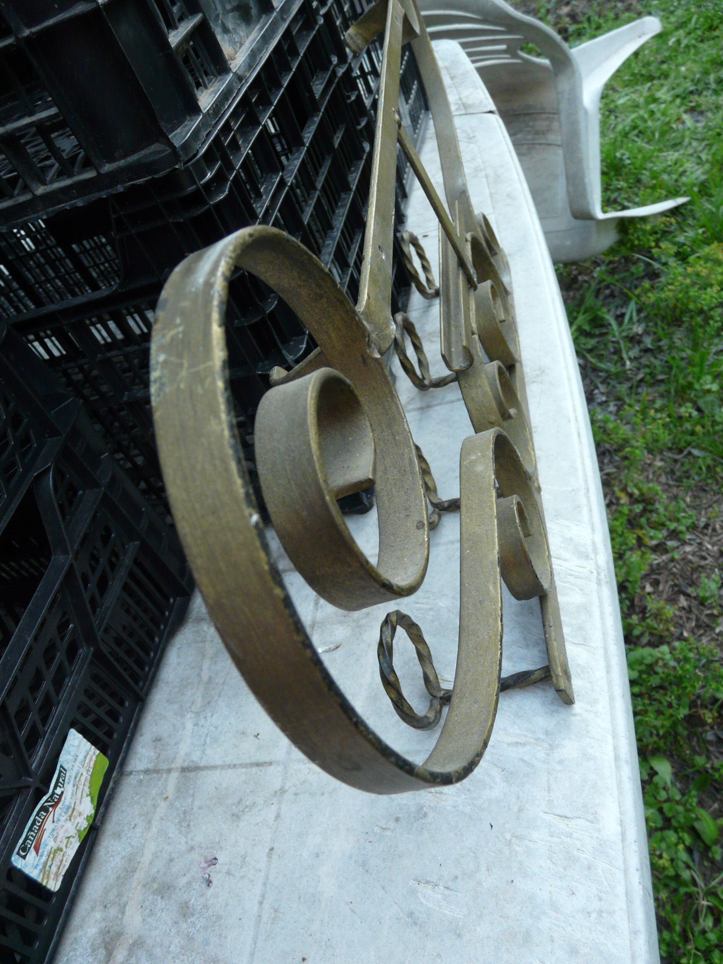 Wall mounted wrought iron coat rack from the 1970s