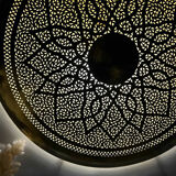 Large oriental wall lamp in hammered gold-plated perforated brass, 100 cm.