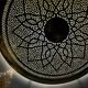 Large oriental wall lamp in hammered gold-plated perforated brass, 100 cm.