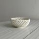 white openwork ceramic cup