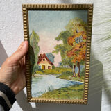 Small landscape painting with golden frame