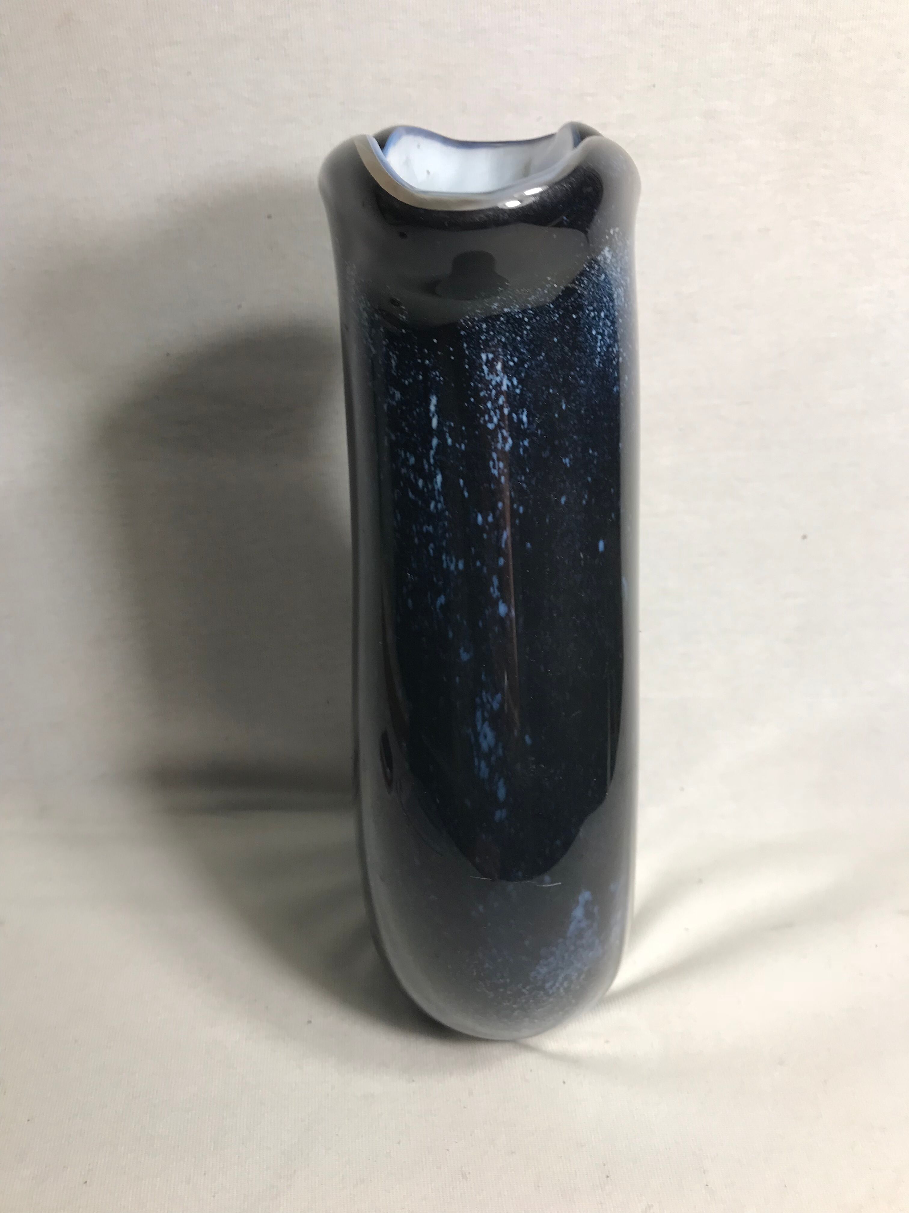 Old glass vase multilayer blue, white vintage interior