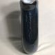 Old glass vase multilayer blue, white vintage interior