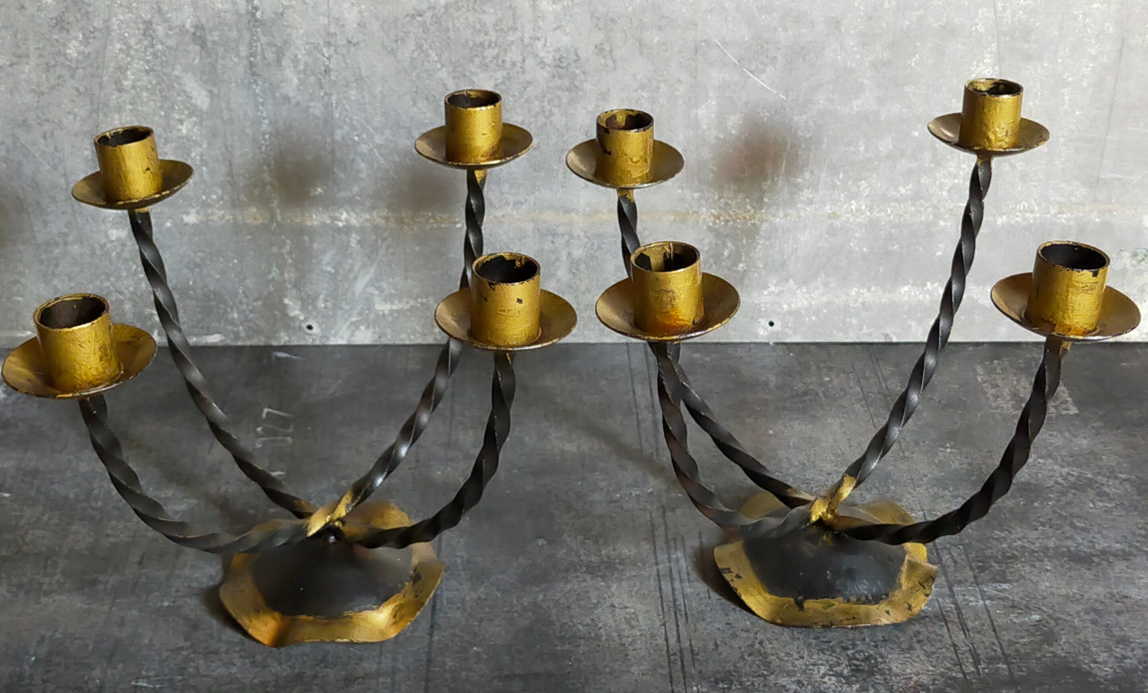 Pair of wrought iron candle holders four arms 50s