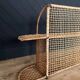Steel and wicker wall shelf