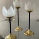 Trio of glass and metal candle holders