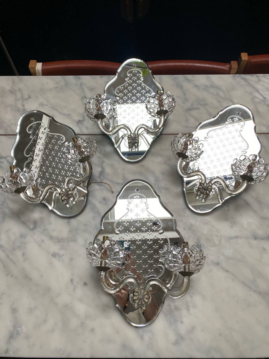 Venetian wall lights with Baccarat crystal mirror.