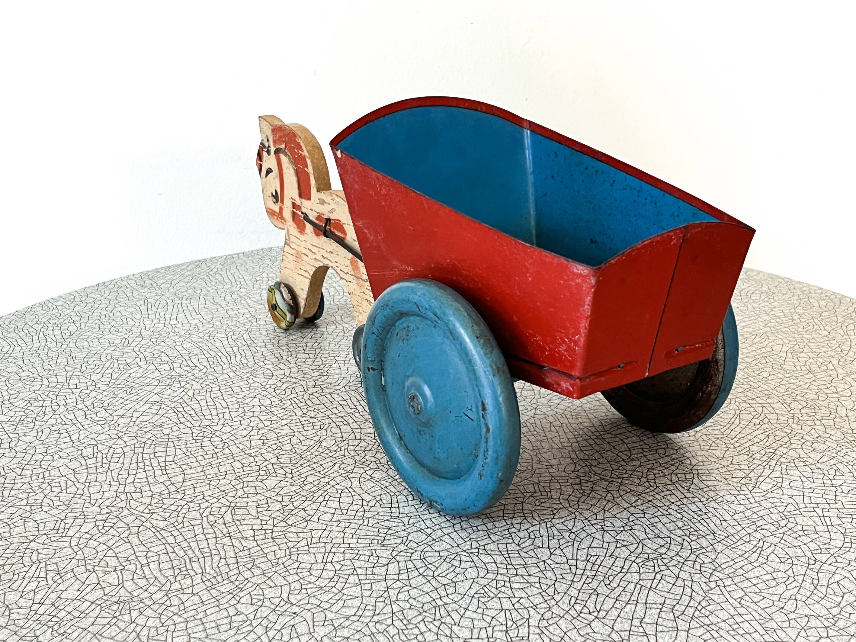 Horse cart and tin cart, old pull toy.