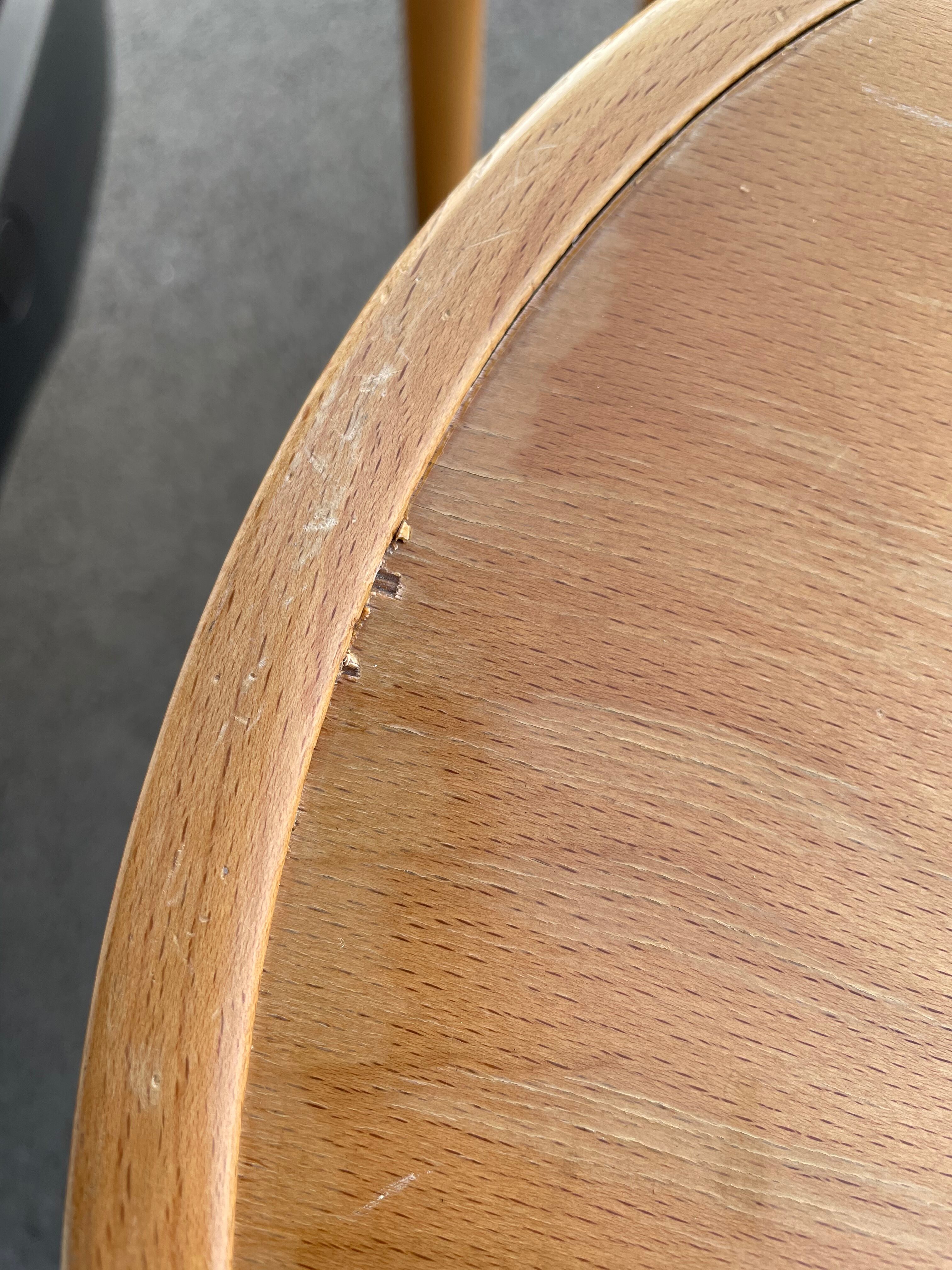 Curved wooden bar stool