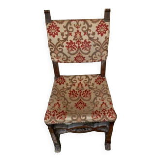 Antique wooden chair with upholstery