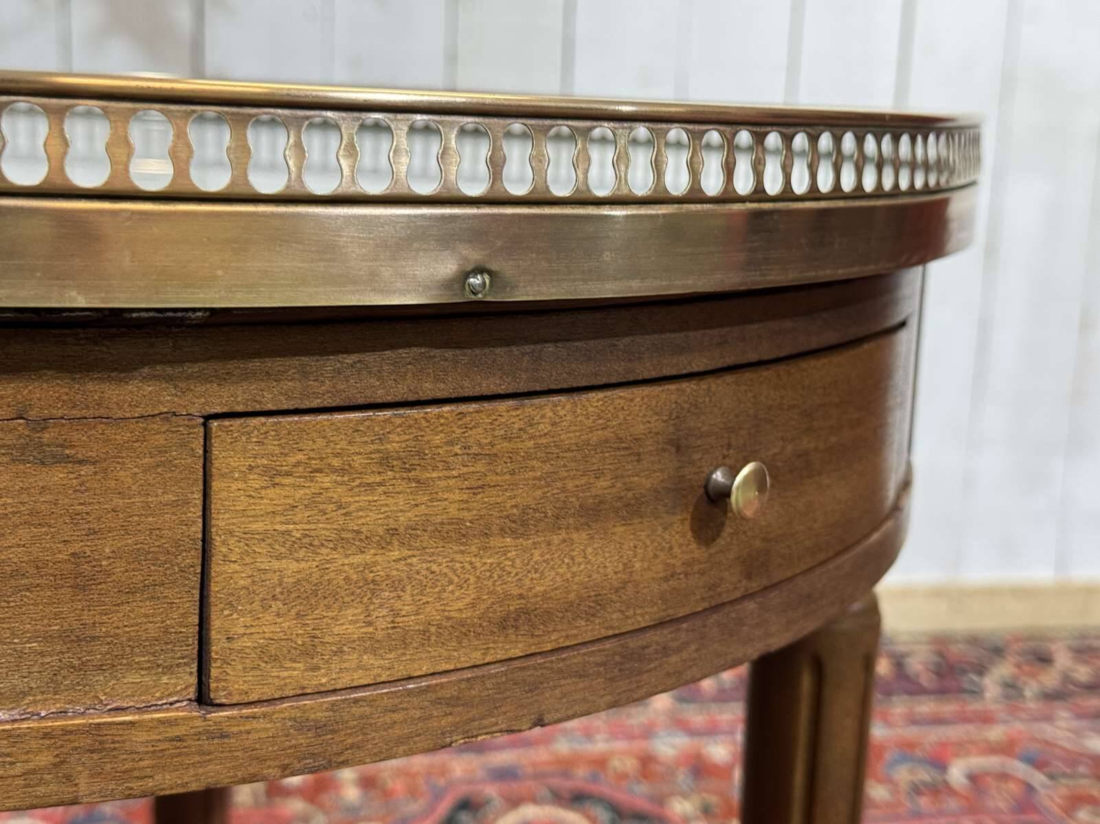 Louis XVI style bouillotte table from the 1960s in mahogany with a marble top.