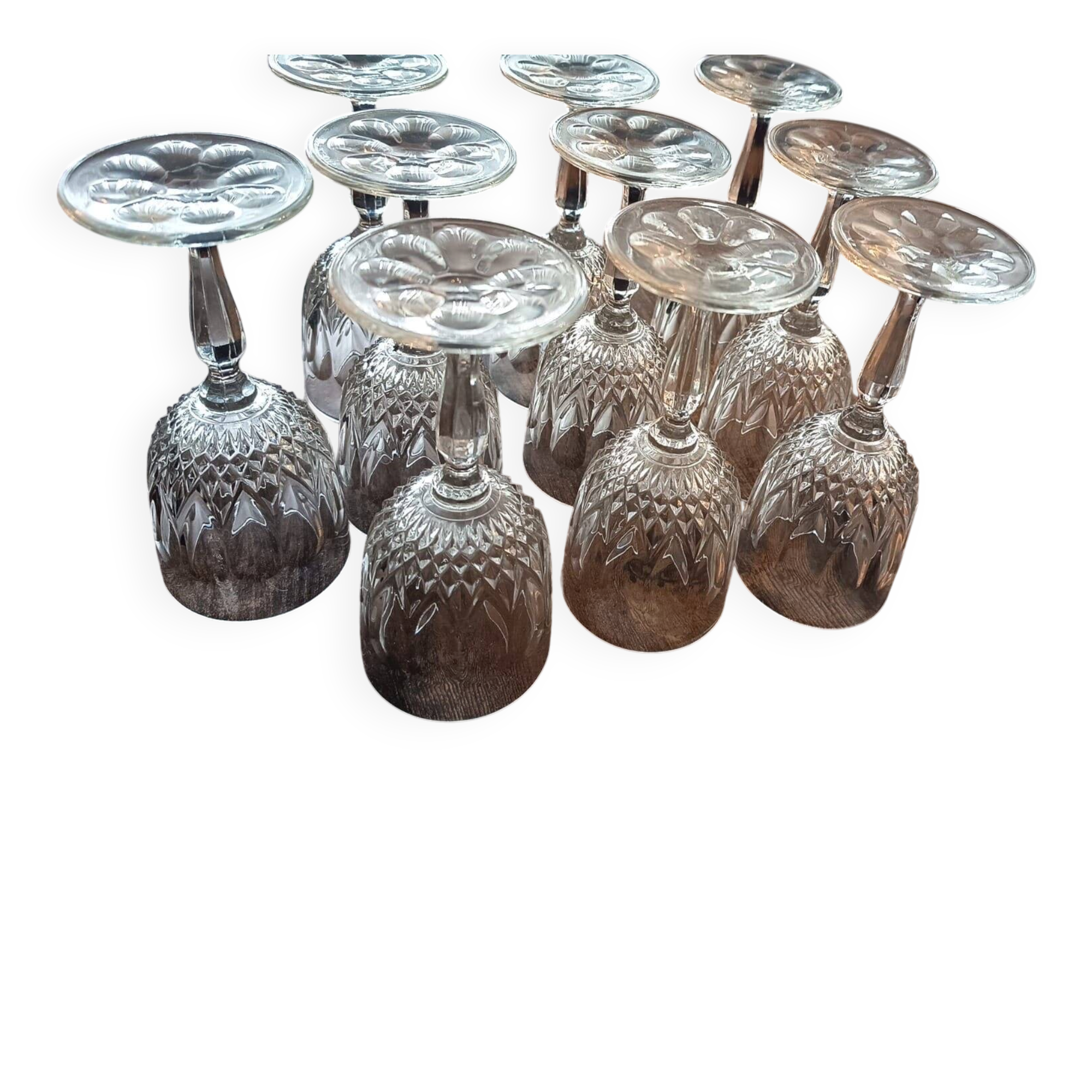 Set of nine vintage cut crystal wine glasses.