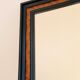 Old wall mirror 72 x 52 cm in black wood and faux mahogany