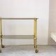 Gold metal and smoked glass server