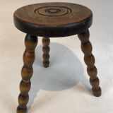 Dark turned wood tripod stool