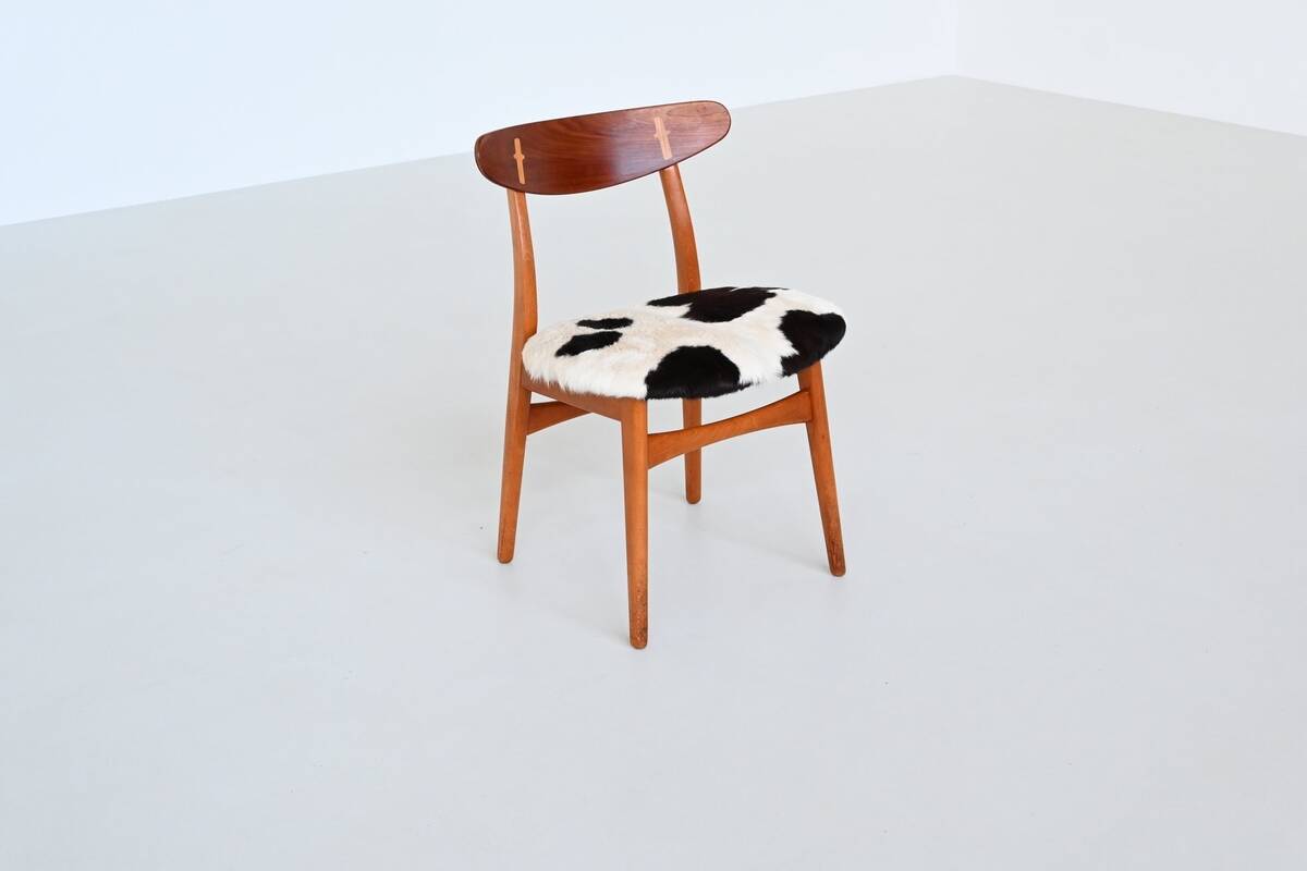 Hans Wegner model CH30 dining chairs in cowskin Carl Hansen Denmark 1952