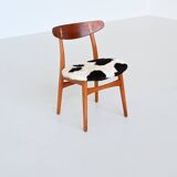Hans Wegner model CH30 dining chairs in cowskin Carl Hansen Denmark 1952