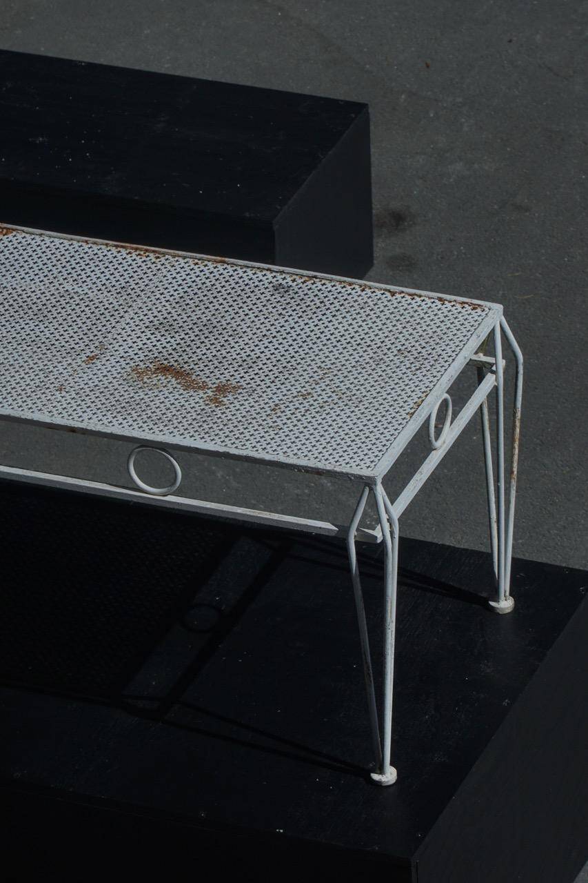 Metal coffee table in French garden style, mid-century modern, with perforated top, 1950s.