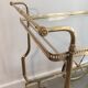 Neo-classical table in gilded metal and glass